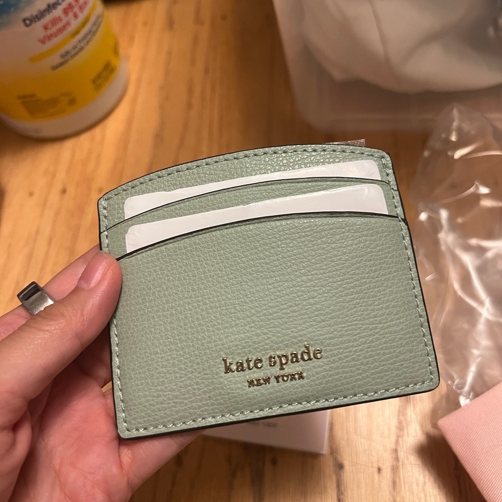 Mint green embossed Kate spade card holder NWT